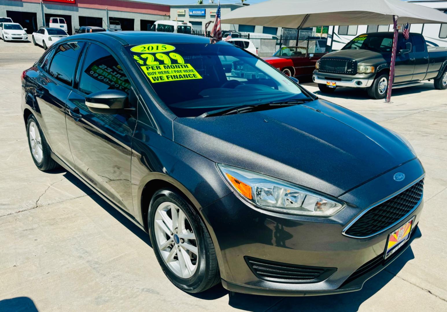 2015 grey Ford Focus (1FADP3F27FL) , located at 2190 Hwy 95, Bullhead City, AZ, 86442, (928) 704-0060, 0.000000, 0.000000 - 2015 Ford Focus SE. 88k miles. new transmission with warranty. runs and drives great. completely serviced. free warranty, free carfax. buy here pay here. we finance. only at Dunton Motors. - Photo#0